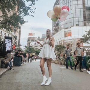 White plunge neckline formal photoshoot dress